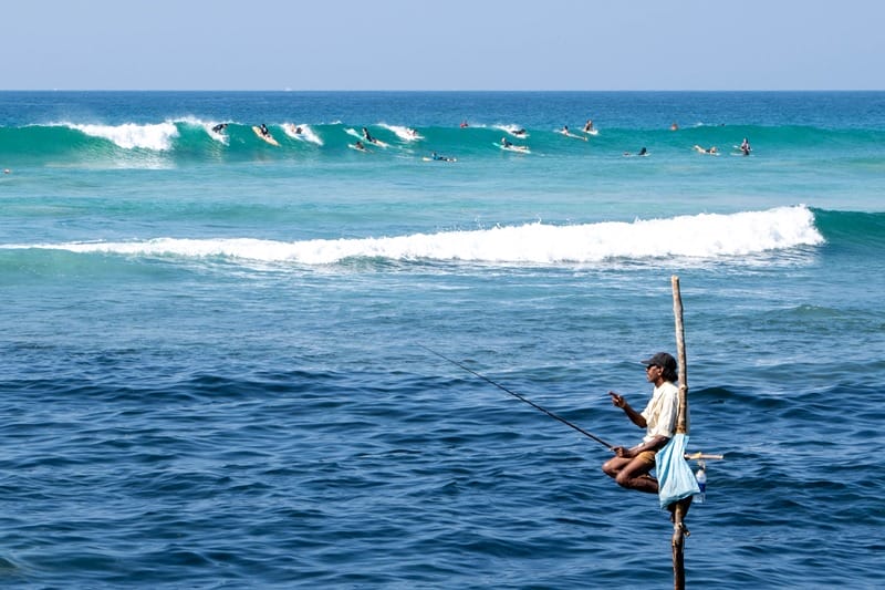 Stilt fishermen in Ahangama Sri Lanka